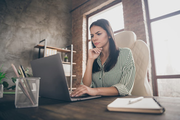 Portrait of her she nice attractive focused busy hardworking businesslady creating presentation report data analysis meeting deadline at modern industrial brick loft interior style work place station