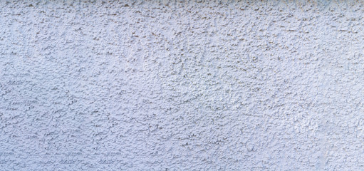 Stone wall split in half with light patterns with copy space