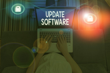 Writing note showing Update Software. Business concept for adds minor software enhancements and...