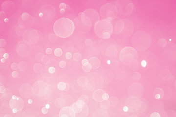 abstract bokeh light effect with pastel gradient pink background