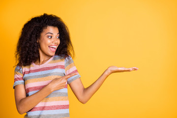 Portrait of her she nice attractive cheerful cheery amazed wavy-haired girl wearing striped tshirt...