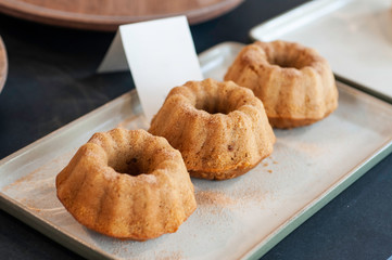 Cinnamon maple apple cake arrange on white plate serve with tea or coffee.  Bakery sesert.