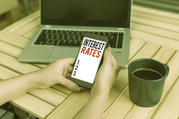 Word writing text Interest Rates. Business photo showcasing proportion of a loan charged as...
