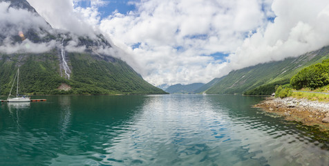 Beautiful Norwegian landscape. view of the fjords with turquoise water. Norway ideal fjord reflection in clear water. Panoramic view