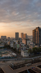 Naklejka na ściany i meble Cityscape of Ho Chi Minh City, Vietnam in the morning