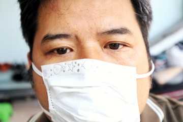 Asian man in medical mask