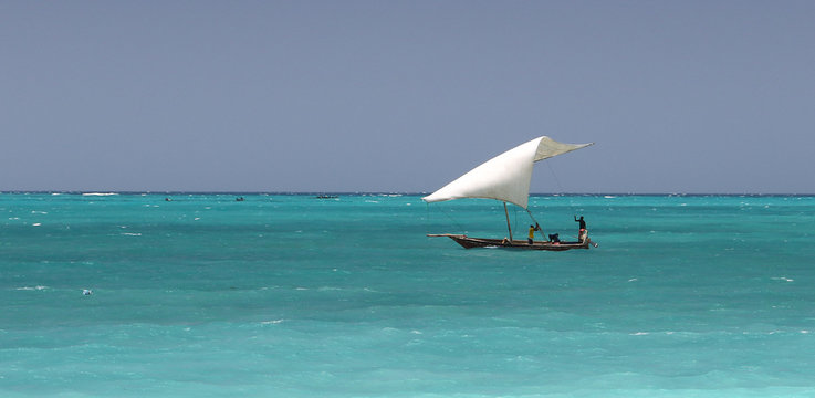Fisherman in traditional dhow african sailing boat