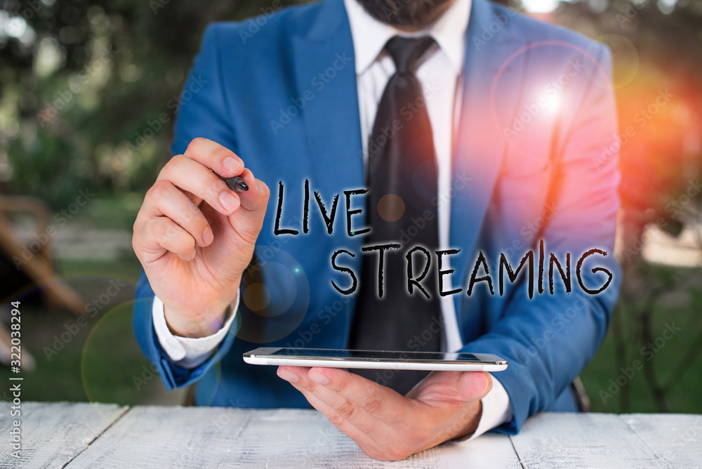 Poster conceptual hand writing showing live streaming. concept meaning media simultaneously recorded and br