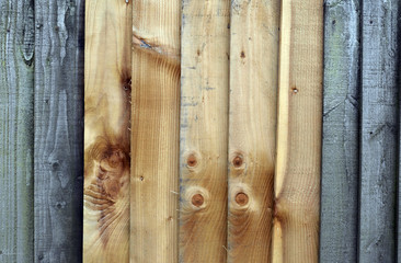 Wooden Fence with Vertical Boards 