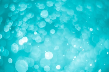 abstract aqua blue background with soft blur bokeh light effect