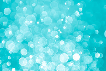 Fototapeta na wymiar abstract aqua blue background with soft blur bokeh light effect