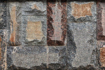 Close-up rectangular granite blocks of different colors and sizes