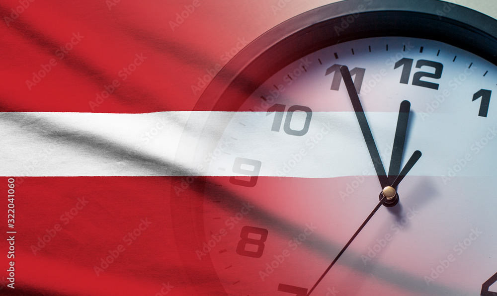 Wall mural composite image of the latvia flag and clock