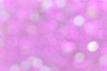 white and pink bokeh background with glitter.