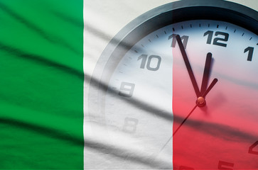 Italian flag with dial of a clock