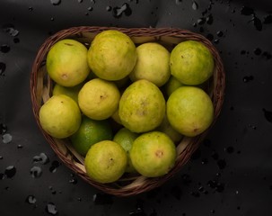 fresh lemon in a wooden basket