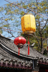 Chinese lantern decorations in Vintage Historical Chinese House Structure,Chinese calligraphy Translation:good bless for new year