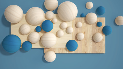 Minimal blue colored background, copy space, wooden planks, cutting board, spheres, bubble made of wood. Interior design concept, mood board