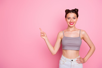 Photo of attractive lady cute buns red lips slim shapes indicate finger empty space show low prices...