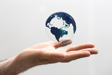 Hand Holding World digital 3d.