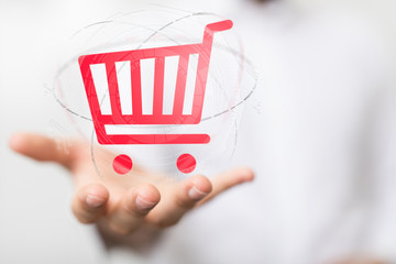 Businessman pressing modern technology panel shopping cart web phone credit card.