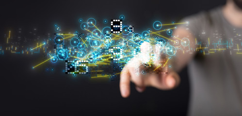 Businessman pressing document icon over computer binary code