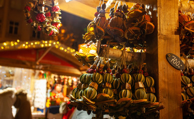 Festive dried fruit hangings at a booth at a christmas market