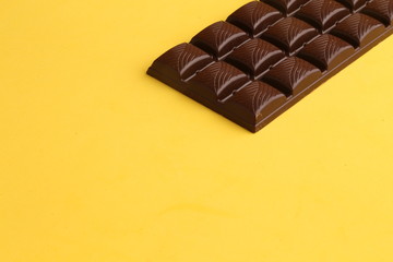 milk chocolate tablet in color background