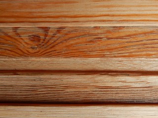 Fototapeta premium lacquered surface of thin wooden planks with a clear pattern and flakes of exfoliated lacquer