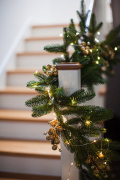 Christmas decor at the wooden stairs in the house