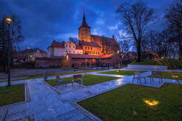 Fototapeta premium Urban lighting of the squares and the historic cathedral in the city of Olsztyn - Poland