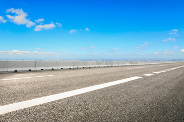 Fototapeta premium High angle Shanghai city skyline and empty asphalt road