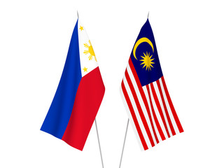 National fabric flags of Malaysia and Philippines isolated on white background. 3d rendering illustration.