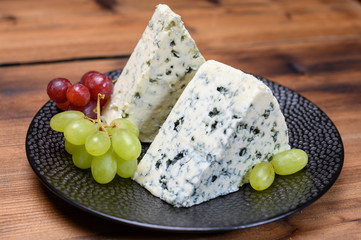 Cheese collection, strong Danish blue cheese Danablu with blue mould.