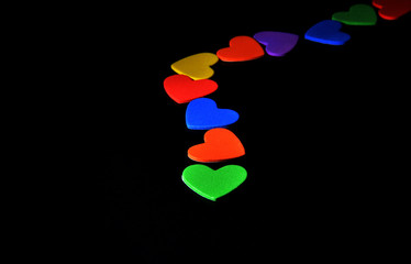 colorful hearts on black background