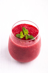 Glass of strawberry and raspberry smoothie