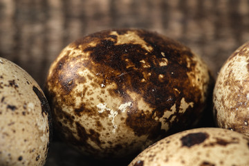Quail eggs on a wooden table