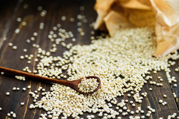 Wooden spoon with sorghum grain