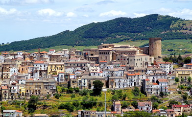 Fototapeta na wymiar Italy. Panorama of the city of Tricarico on a hill overlooking the Norman Tower and the monastery of St. Chiara. Basilicata.