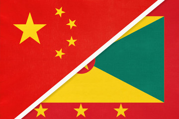 China or PRC vs Grenada national flag from textile. Relationship between asian and american countries.