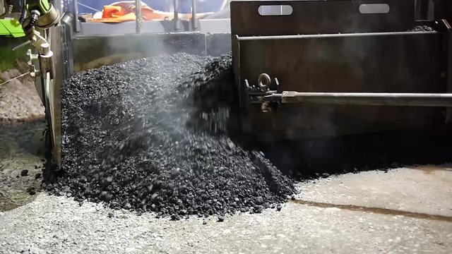 Frischer Asphalt Nahaufnahme Asphaltfertiger Autobahnbaustelle