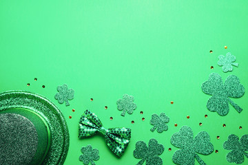 Happy Saint Patrick's Day greeting card with traditional symbols, shamrock, green attire. Green...