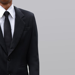 Business man suit and background gray color.