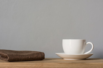Coffee espresso on wood table nature background in garden,warm tone