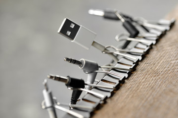 Close-up of homemade cable and cord organizer.    