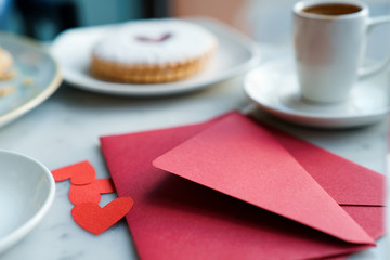 Red hearts on a breakfast table