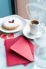 Valentine's day breakfast with cookies and coffee