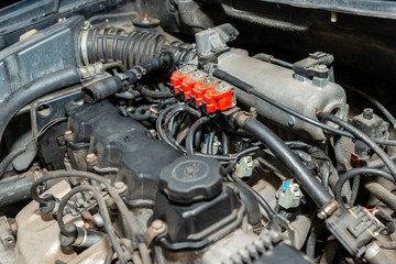 Close up of LPG converted engine. Disassembled motor vehicle for repair