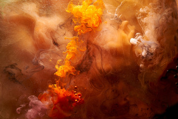 Vibrant colors of outer space ocean pattern abstract background. Mixing paint and liquid smoke, colorful splash and swirl of drops, underwater mystical backdrop
