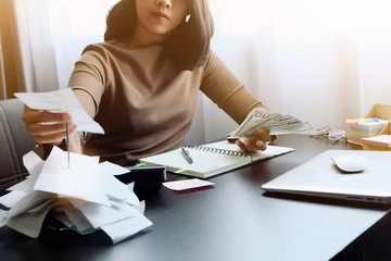Asian woman is clear, manage for expenses, it's important of account and finance of company. By...